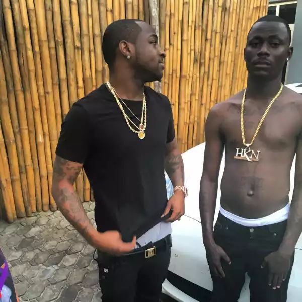 Photo: Davido Finally Meets The Fan Who Has A Tattoo Of Him All Over His Body